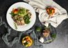 달라진 식단 트렌드, 꾸준한 실천이 건강을 만든다 a white plate topped with meat and veggies